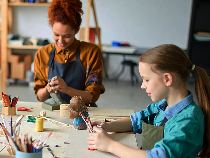 Student and Teacher inside the Wearable Art lab